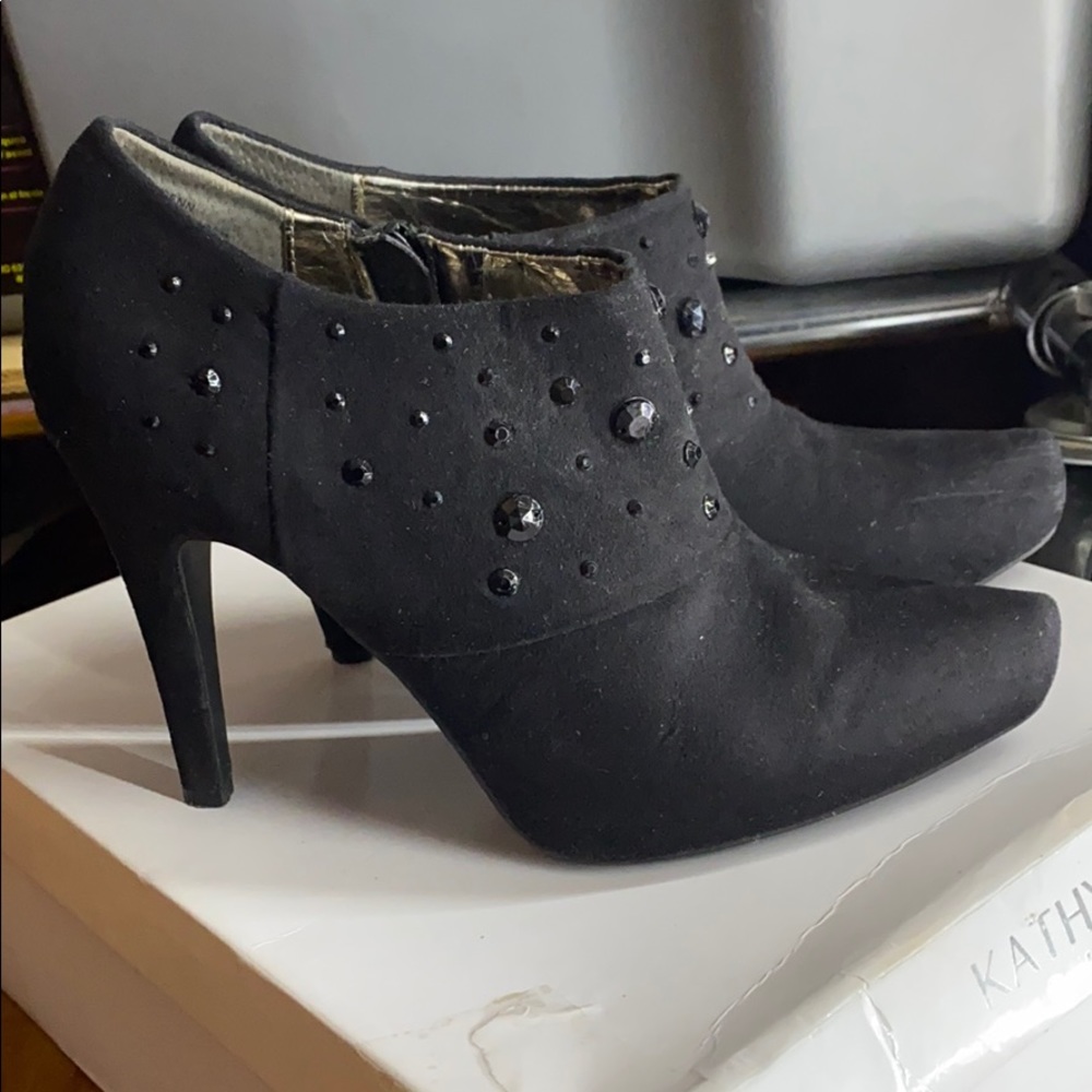 Black faux suede booties with stone details